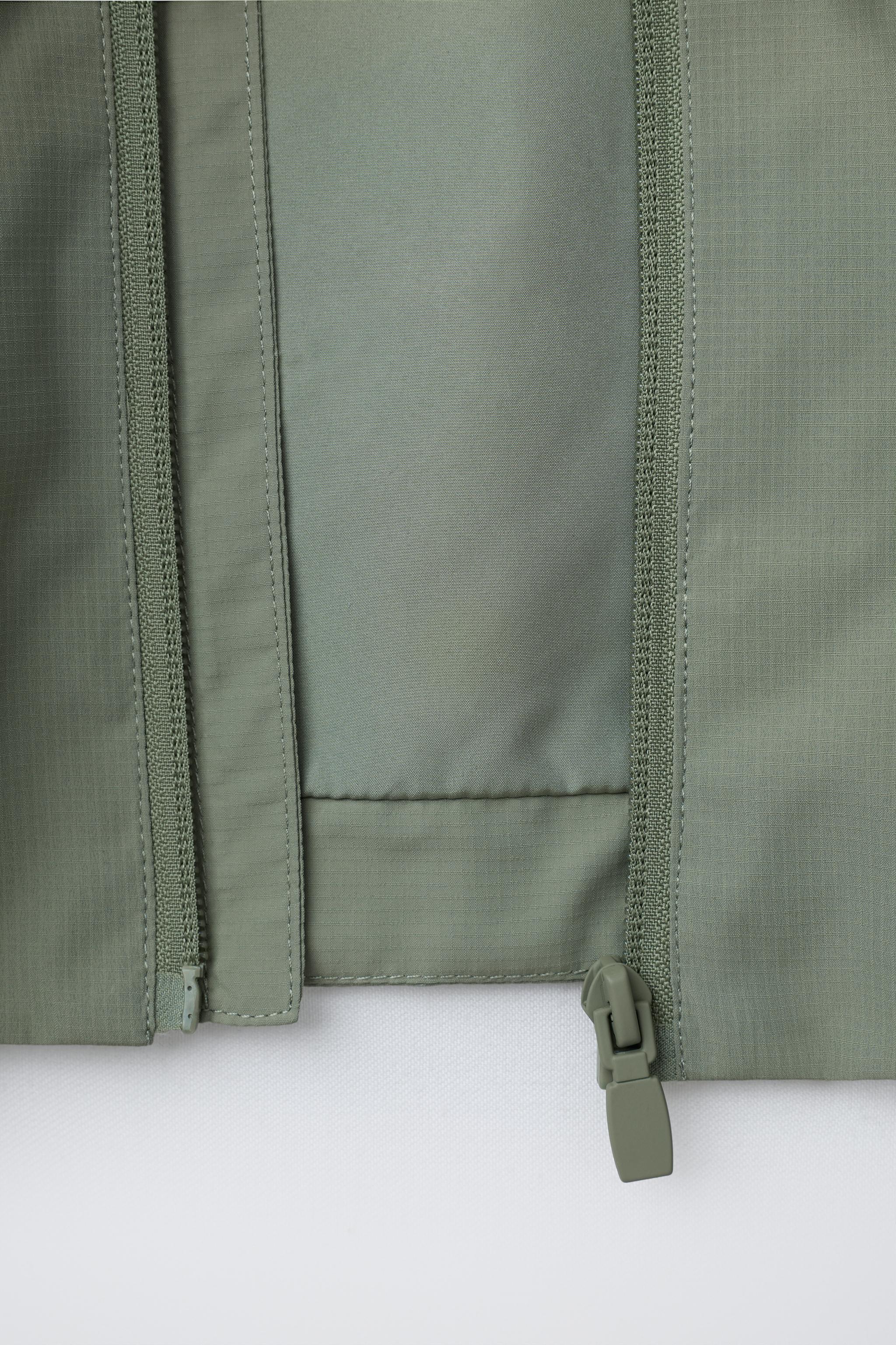 INTERLOCK WATER REPELLENT RAINCOAT